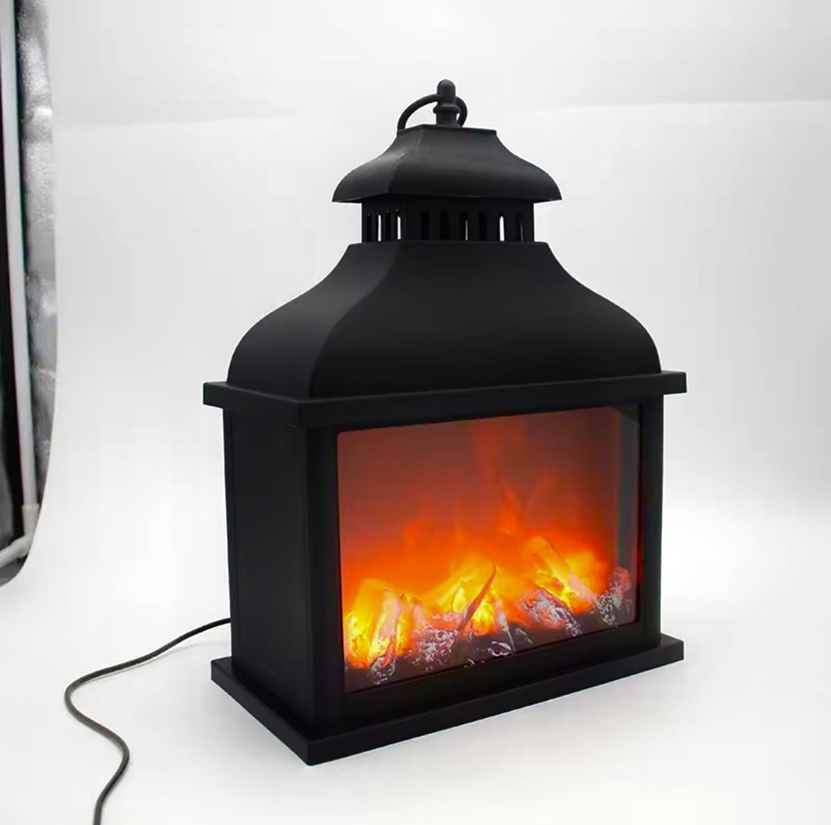 مدفأة ديكورية محمولة و مضيئة بإضاءة اللهب